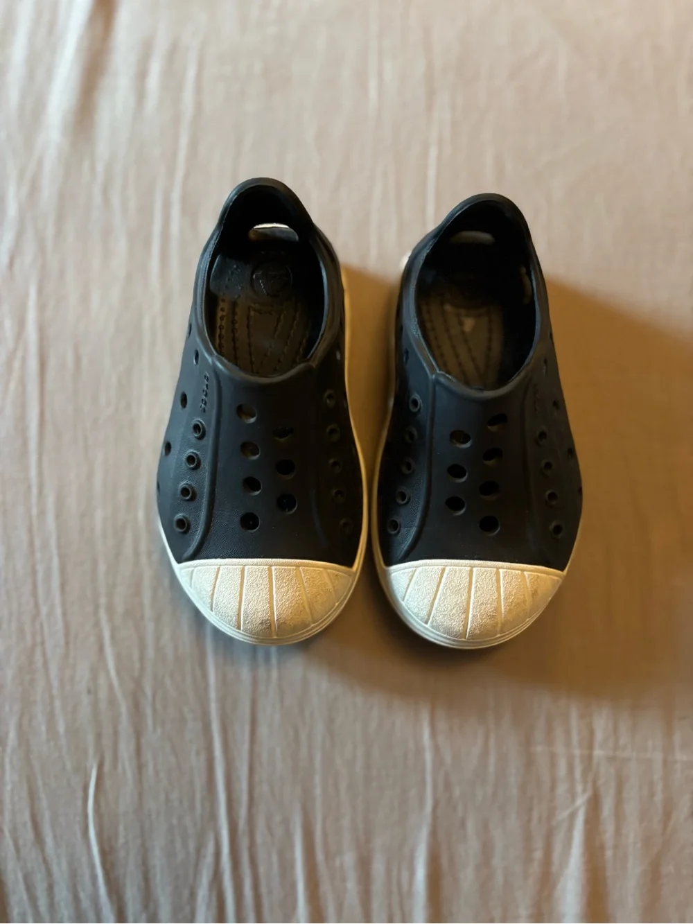 Kids Black Slip-On Water-Resistant Slip On Crocs with White Toe Cap